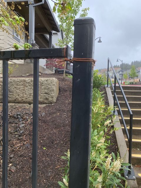 before1_welding broken gate with a string around it