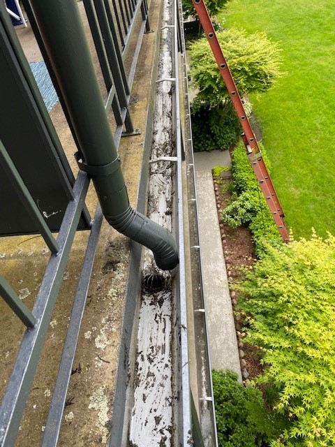 gutter that is free from debris and clutter after being cleaned