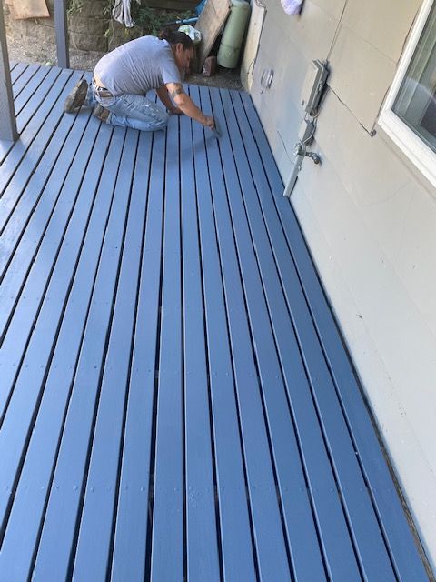 HOA maintenance painted a deck blue