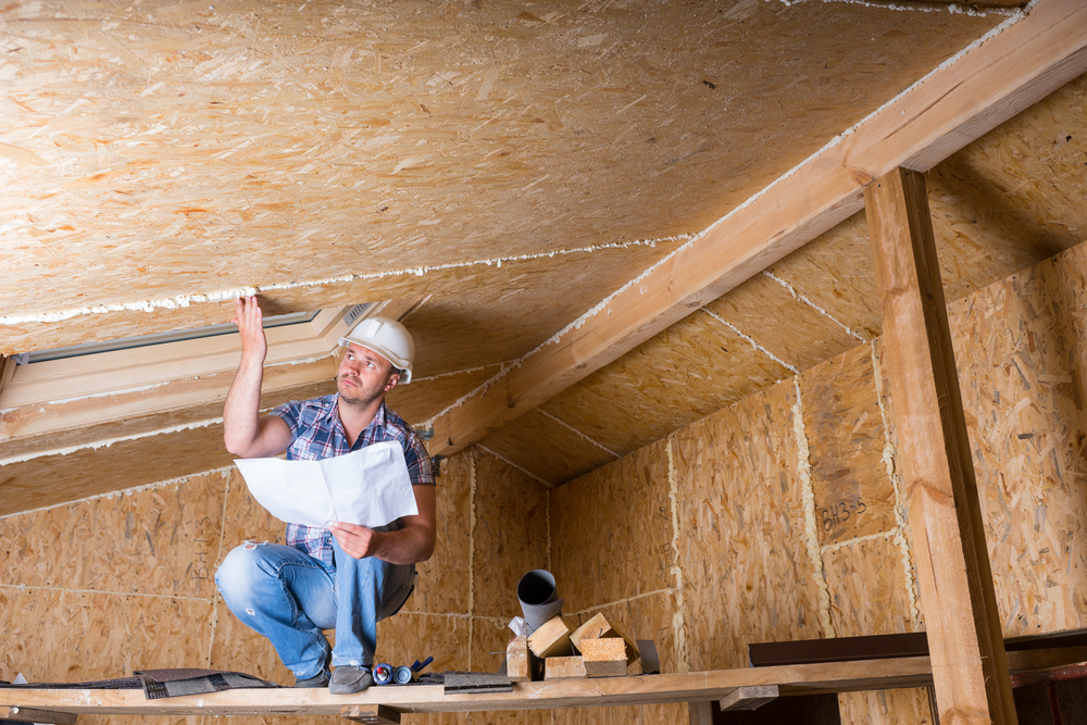 Male,Construction,Worker,Builder,Wearing,White,Hard,Hat,Crouching,On inspector inspecting a crawl space that needs to be remediated