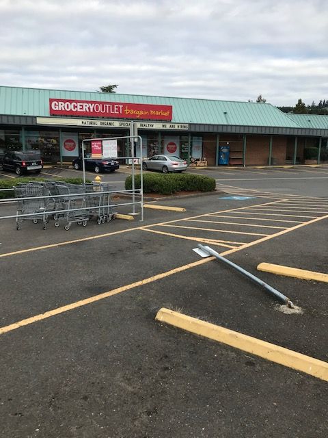 sign that fell at grocery outlet parking lot