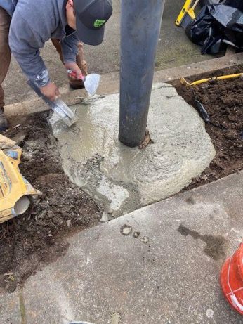 contractor adding concrete to a property