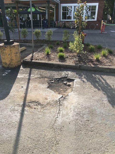 pothole in parking lot